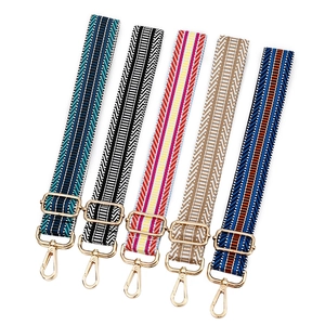 Bandoulières réglables avec motifs jacquard colorés et mousquetons en métal doré