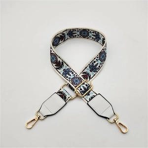 Ethnic style adjustable wide shoulder strap with blue floral print and gold hardware