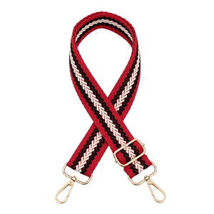 Adjustable woven shoulder strap for bags with red geometric pattern and gold buckles