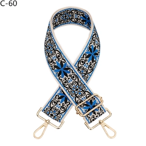 Close-up of ethnic star pattern woven strap with gold alloy swivel snap hooks