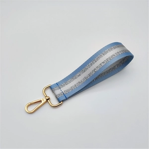 Sky blue strap with silver glitter stripes and gold metal lobster clasp for bags and keys