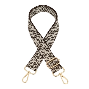 Detail of geometric jacquard bag strap with gold metal lobster clasps and buckle