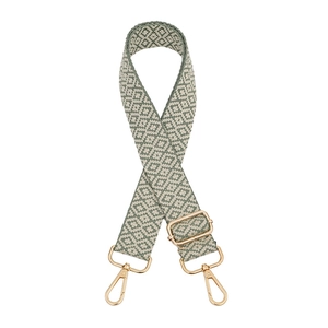 Detail of woven green and white diamond pattern bag strap with gold metal lobster clasp