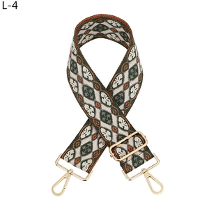 Detail eines verstellbaren gewebten Gurts mit grün-orangefarbenem Jacquard und Goldhaken