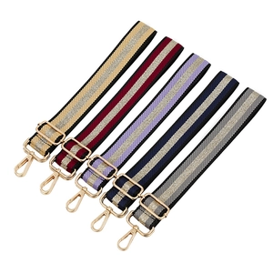 Adjustable striped shoulder straps with gold metallic thread and lobster clasps for bags