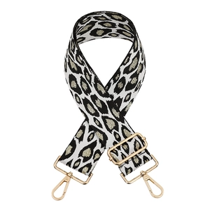 Adjustable leopard print bag strap with black white gold webbing and metal hooks