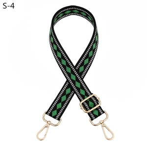 Adjustable woven shoulder strap for bags featuring green rhombic pattern and gold hardware