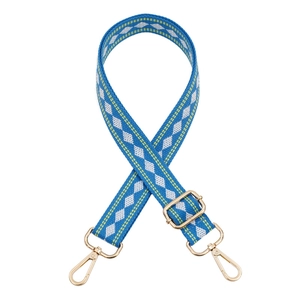 Adjustable woven canvas shoulder strap with blue geometric patterns and gold metal buckles