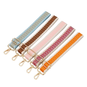 Thick jacquard handbag straps in assorted colors with gold hardware and herringbone pattern
