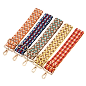 Adjustable checkerboard woven shoulder straps with gold lobster clasps in five colors