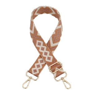Adjustable wide jacquard bag strap with geometric diamond pattern and gold metal hooks
