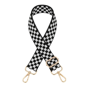 Adjustable black and white checkered shoulder strap with gold metal lobster clasps for bags