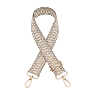 Adjustable woven replacement bag strap with blue geometric pattern and gold hardware