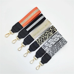 Set of six stylish leopard and striped bag straps with durable golden lobster clasps