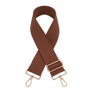 Close-up of dark brown wide fabric replacement strap with light gold lobster clasps