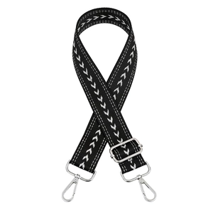 Adjustable black and white herringbone pattern shoulder strap with silver metal buckles