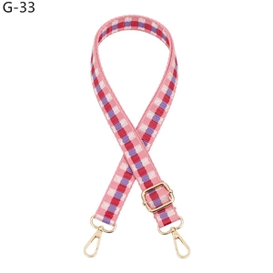 Adjustable pink plaid nylon shoulder strap with golden metal lobster clasps for bags
