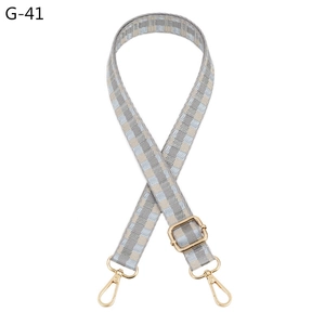 Adjustable 2.5cm checkered bag strap with grey and blue weave and gold metal hooks