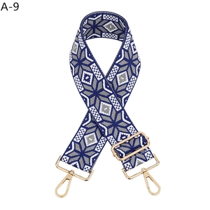 Ethnic wide adjustable bag strap with blue geometric weave and gold metal lobster clasps