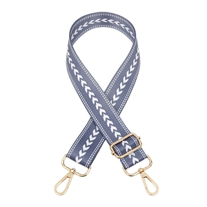 Adjustable grey-blue nylon bag strap with white heart pattern and gold metal hooks