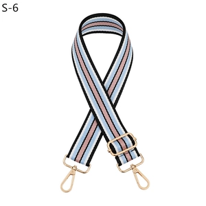 Adjustable striped shoulder strap with blue, pink, white, and gold lobster clasps