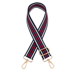 Adjustable woven striped bag strap with red, white, blue colors and gold metal buckles