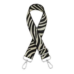 Adjustable zebra print bag strap with durable woven fabric and silver metal swivel hooks