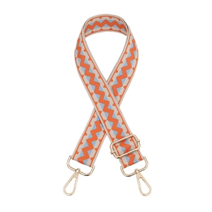Adjustable orange and blue zigzag woven bag strap with gold lobster clasps and slider