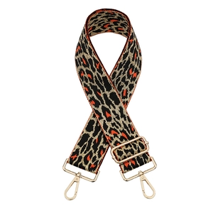 Adjustable leopard print wide shoulder strap with orange spots and gold hardware