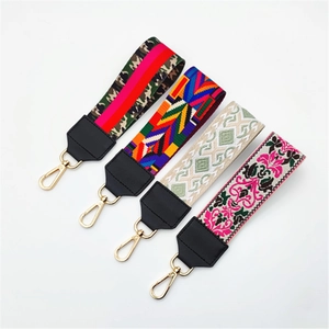Adjustable crossbody bag straps set with vintage embroidery and gold lobster clasps