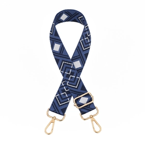 Adjustable woven shoulder strap for bags with blue geometric diamond pattern and gold metal hooks