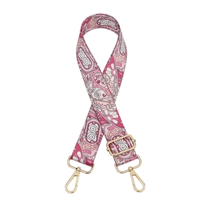 Adjustable wide replacement bag strap with pink paisley print and golden metal buckles