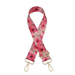 Verstellbarer breiter Taschengurt mit rosa Blumendruck und goldenen Metallkarabinern