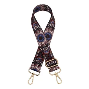 Close-up of bohemian style adjustable wide replacement strap with gold metal buckles
