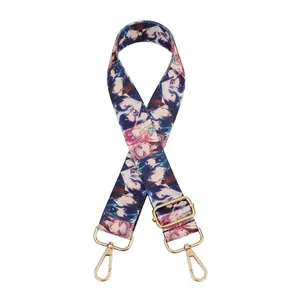Detail view of adjustable anime print bag strap with golden zinc alloy metal swivel hooks