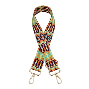 Adjustable woven canvas bag strap with colorful geometric patterns and gold metal clips