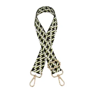 Macro detail of No.46 ethnic style lightning pattern woven strap with gold lobster clasps