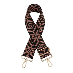 Adjustable crossbody bag strap with black and pink geometric diamond weave and gold buckles