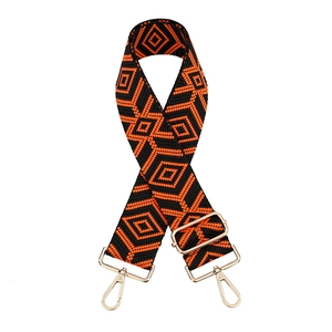 Adjustable wide replacement bag strap with orange and black geometric diamond pattern