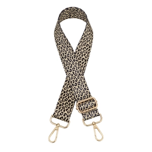 Adjustable leopard print bag strap with golden metal hooks on white background