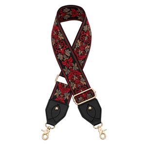 Vue détaillée d'une bandoulière rétro en jacquard avec boucles métalliques dorées réglables