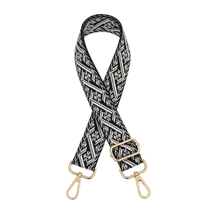 Ethnic style bag strap with black and white geometric pattern and gold buckles