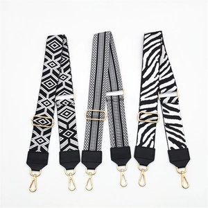 Adjustable wide PU shoulder straps with geometric and zebra patterns and gold hardware