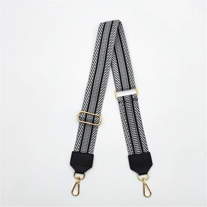 Adjustable black and white geometric pattern PU shoulder strap with gold metal hardware