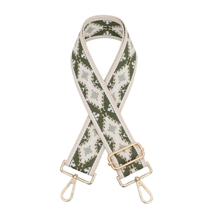 Ethnic style woven shoulder strap with cream and green geometric patterns and gold clips