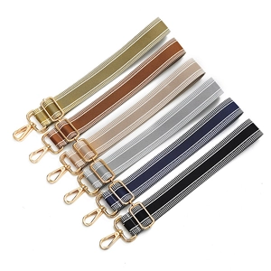 Adjustable canvas shoulder straps in six striped colors with golden metal hooks