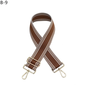 Adjustable brown and white striped bag strap with gold metal lobster clasps and buckle