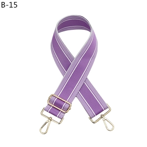 Adjustable purple striped crossbody strap with shiny gold lobster clasps for handbags