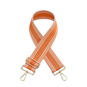 Adjustable orange wide shoulder strap with white stripes and gold swivel hooks