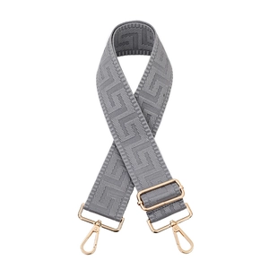 Adjustable wide grey woven bag strap with geometric jacquard and gold metal hooks